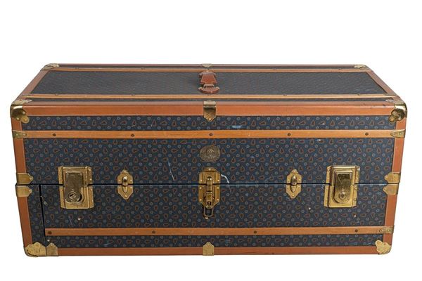 Travel locker trunk marked Berry Logan