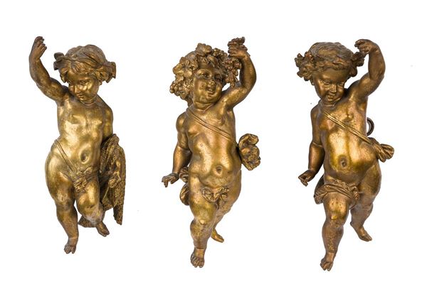 Lotto di 3 putti in bronzo dorato