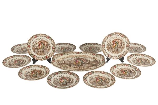 Lot of 1 serving dish and 12 plates