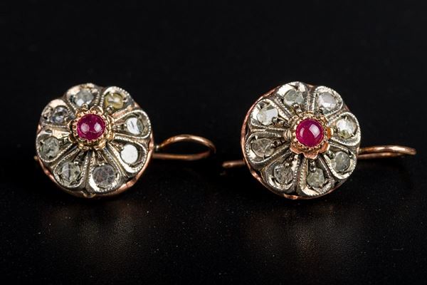 Pair of silver and low gold earrings