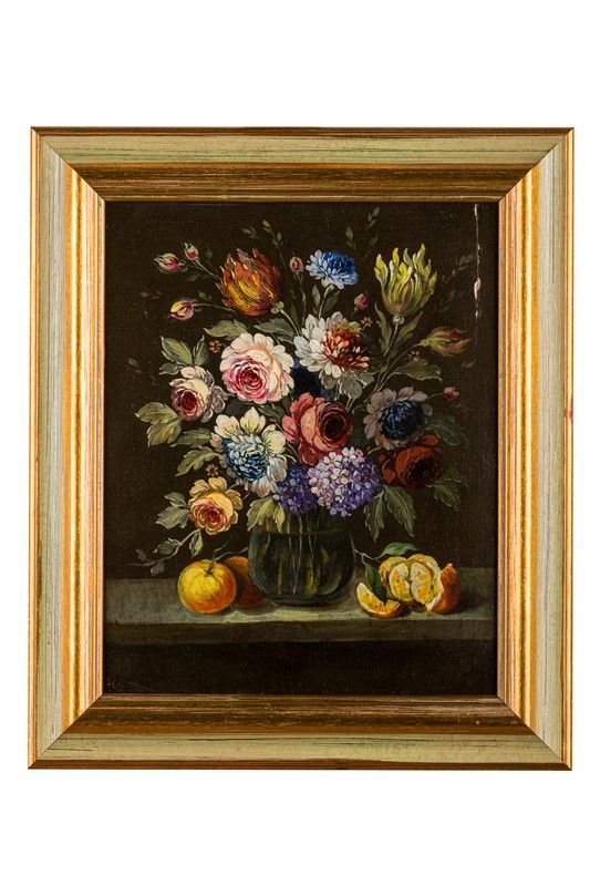 Vaso di fiori con arance