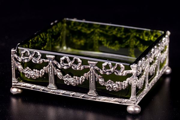 Svuotatasche in argento 