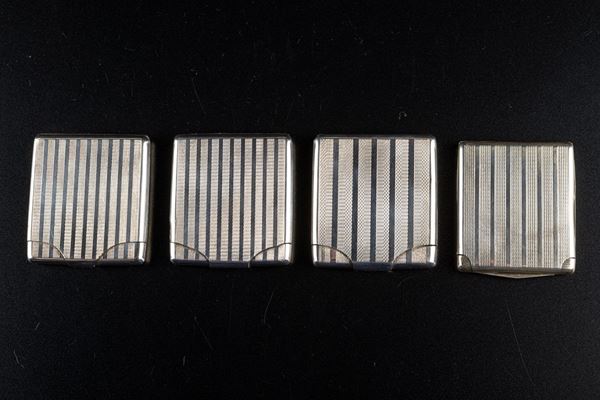 Lot of four matchboxes in 800 silver