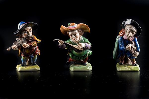 Three porcelain dwarfs