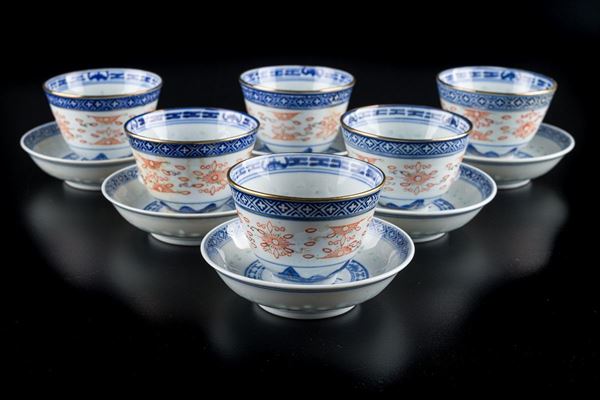Six cups and six saucers