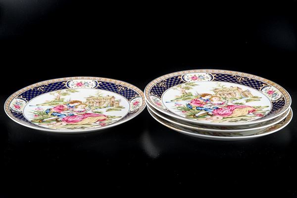 Four porcelain plates