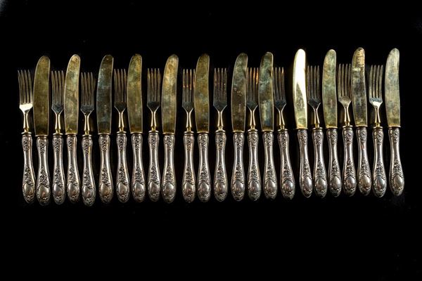 Lot of twelve forks and twelve knives with 800 silver handles
