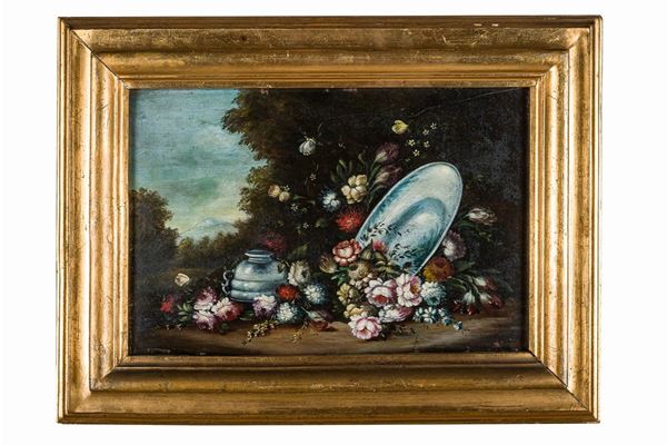 Still life with flowers and tableware