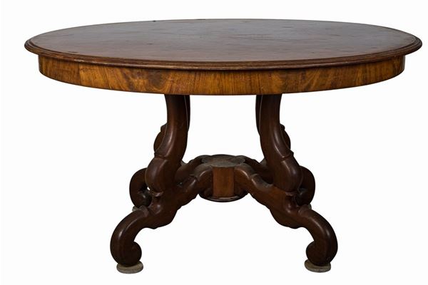 Oval table in walnut