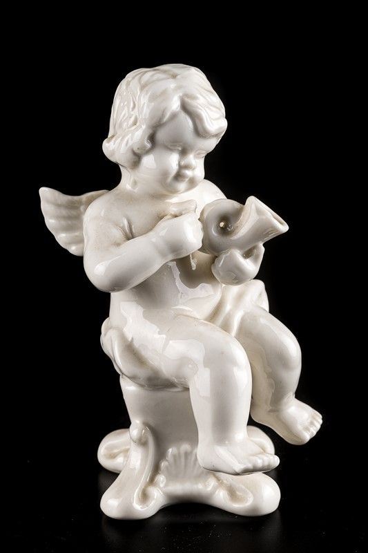 Putto musicante