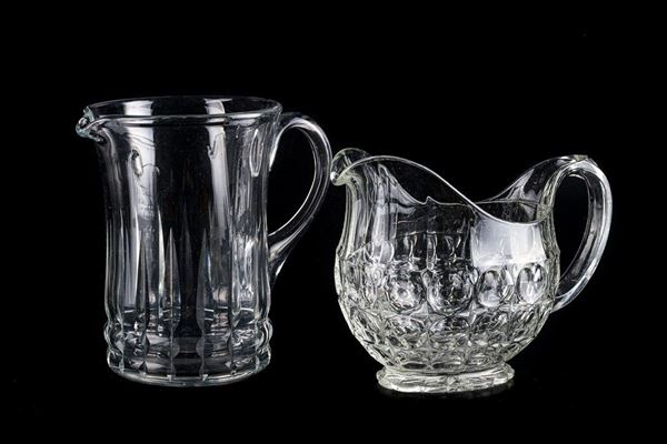 Two cut crystal jugs