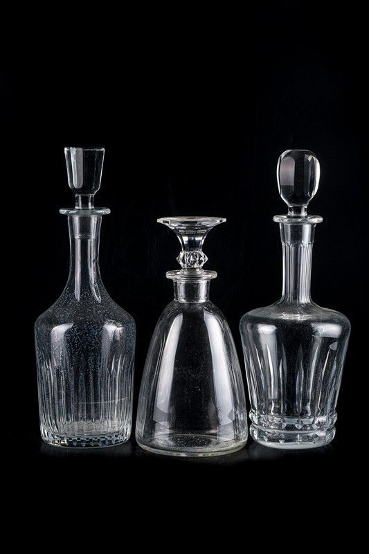 Lots of three glass and crystal bottles
