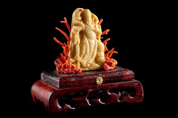Oriental deity sculpture