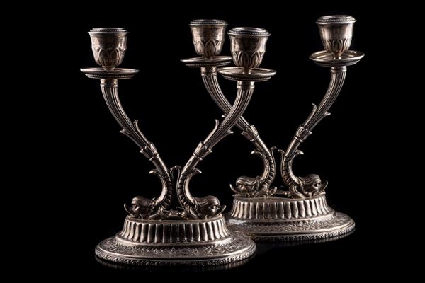 Coppia di candelieri in argento 833/1000