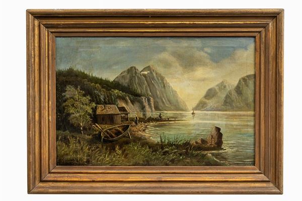 View of fjord with mountains, boats and fishermen