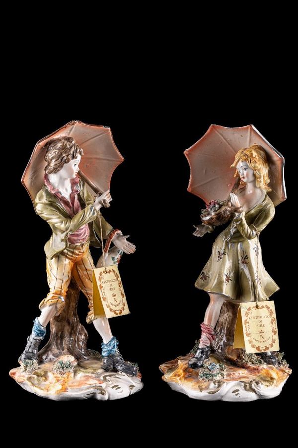 Coppia di statue in ceramica 