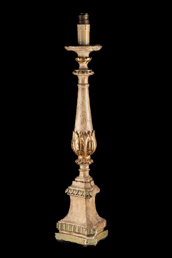 Candlestick in gilded wood
