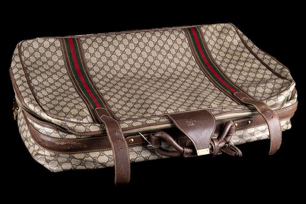 Valigia semirigida Monogram Gucci