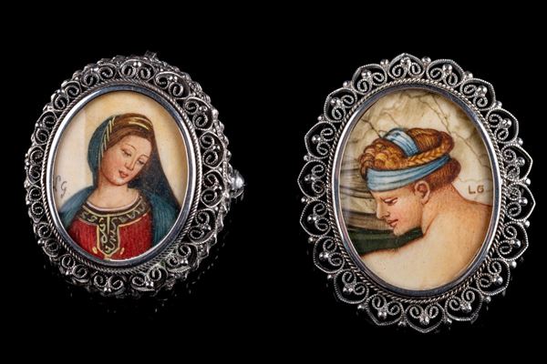 Lotto di due spille/ciondoli in argento 800