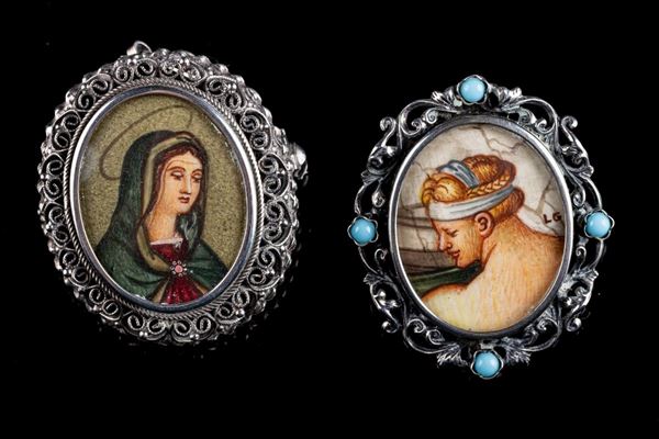 Lotto di due spille/ciondoli in argento 800