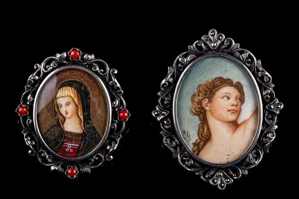 Lotto di due spille/ciondoli in argento 800