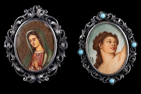 Lotto di due spille/ciondoli in argento 800