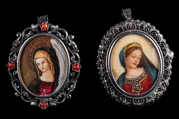 Lotto di due spille/ciondoli in argento 800