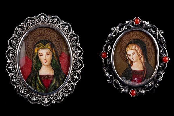 Lotto di due spille/ciondoli in argento 800