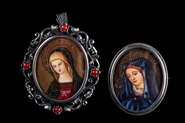 Lotto di due spille/ciondoli in argento 800