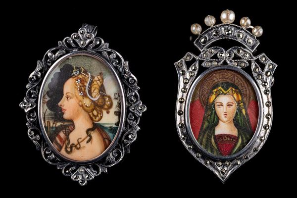 Lotto di due spille/ciondoli in argento 800