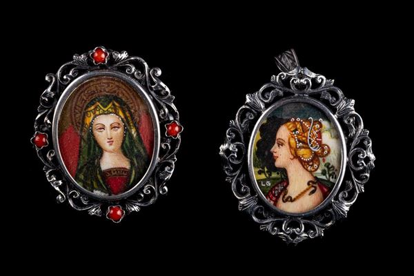 Lotto di due spille/ciondoli in argento 800