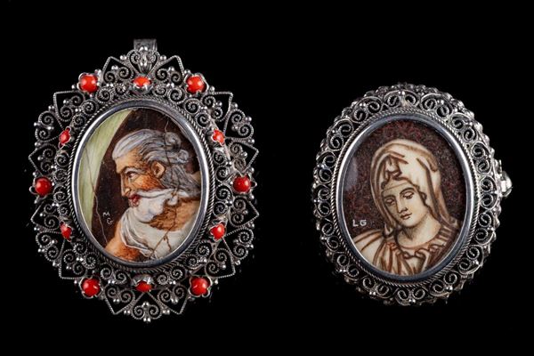 Lotto di due spille/ciondoli in argento 800