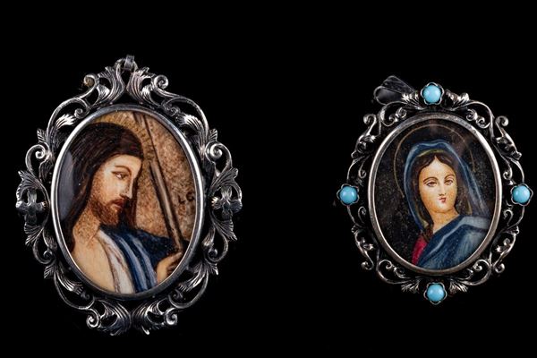 Lotto di due spille/ciondoli in argento 800