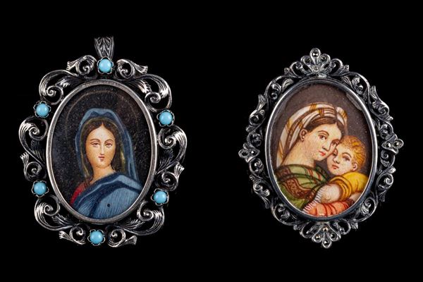 Lotto di due spille/ciondoli in argento 800