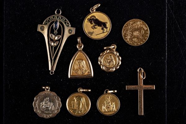 Lot of 8 charms and a gold coin
