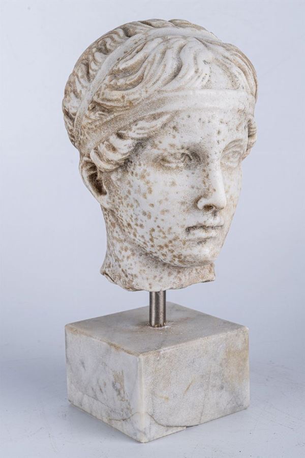 Female head representing Hebe