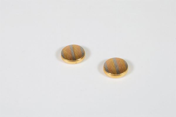 Coppia di copribottoni in oro 750/1000