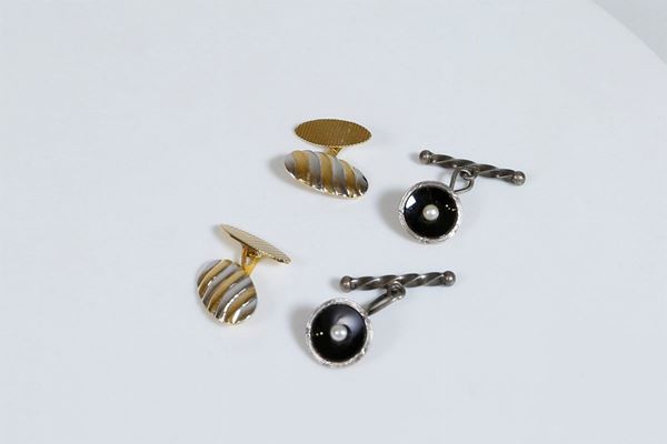 Lot of two pairs of silver cufflinks