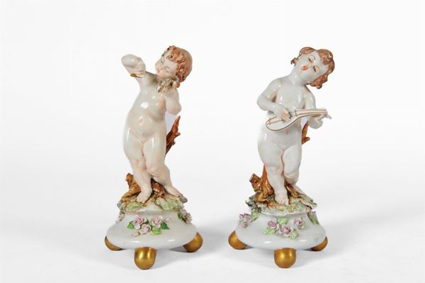 Pair of musician cherubs