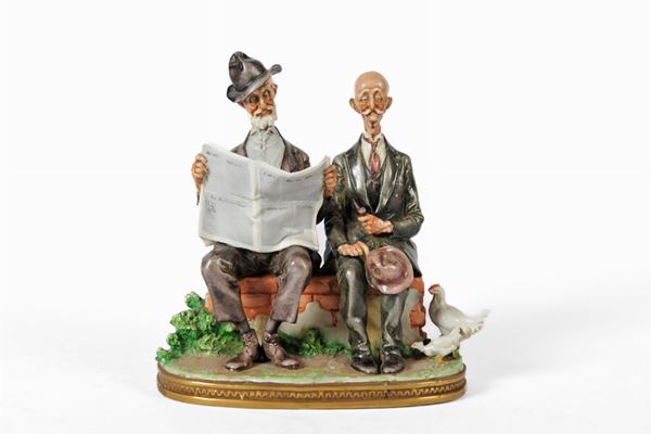 Pair of grandparents on a low wall