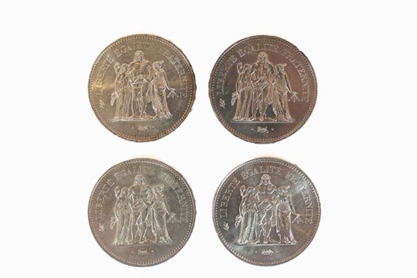 Lot of 4 50-franc coins in 900/1000 silver
