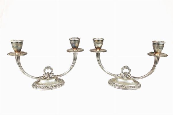 Pair of 800/1000 silver candlesticks
