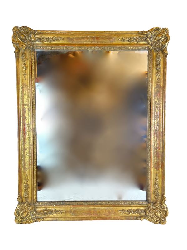 Specchio con cornice dorata