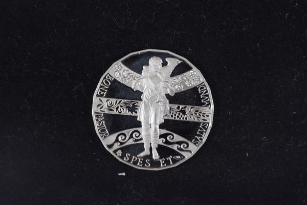 Medaglia in platino e diamanti