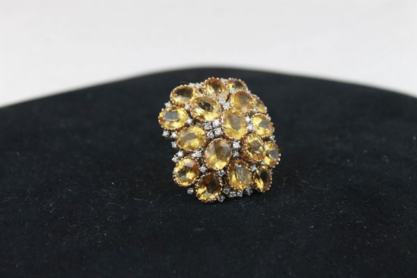 Anello in oro con topazi e diamanti