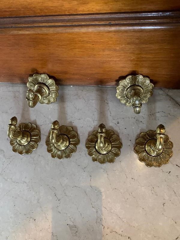 Lotto di 10 ganci in bronzo