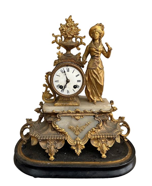 Tre orologi in antimonio