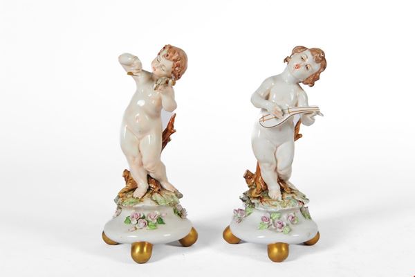 Coppia di putti musicanti