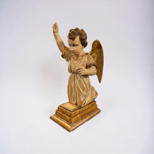 Putto alato