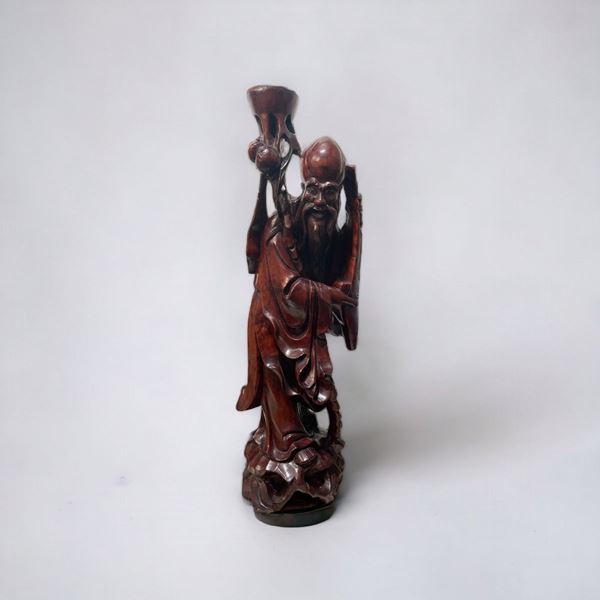 Scultura raffigurante Saggio 